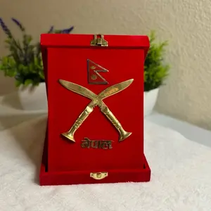 Red velvet frame with Nepali flag and Khukuri