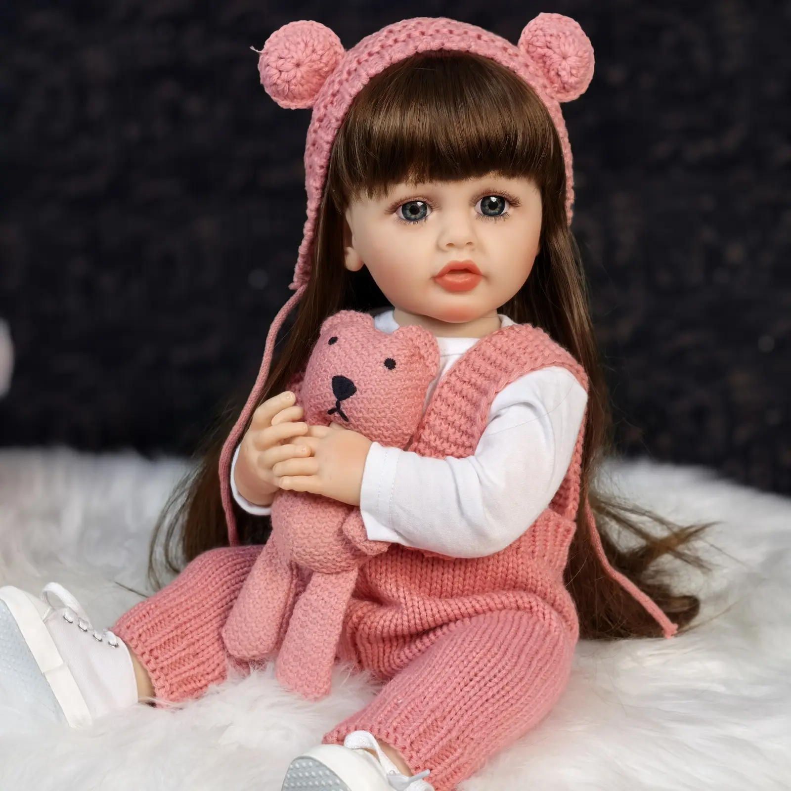KEIUMI 22-Inch Full Body Vinly Realistic Soft Reborn Baby Doll, Long Brown Hair Princess-Style Toy with Milk Bottle, Cute Toys for 3+ Kids as Little Gifts for Girls (Birthday, Christmas) Cute Newborn Doll