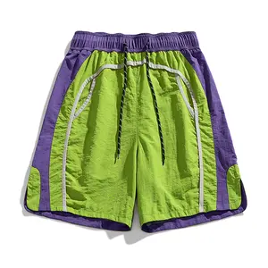 Men’s summer trendy brand shorts with color-block patchwork design—sporty mid-length shorts for outdoor activities, loose fit, versatile short pants, casual and comfortable style, premium quality. #SummerVibes