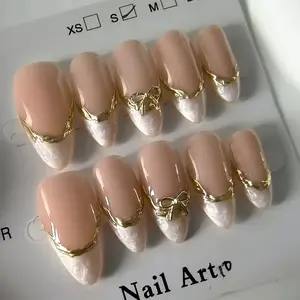 Nail Art 10 PCS Nude Pink French Tip Stiletto Press On Nails with Luxury Gold Bow Elegant False Nails Reusable Glossy Acrylic Nails for Any Occasion