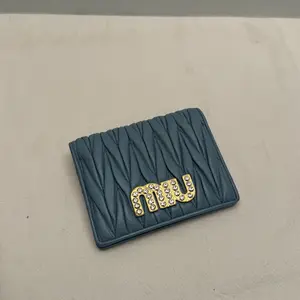 Pre-owned miu miu Nappa Small Leather Goods Matelasse Small Compact Wallet Blue With Crystals CPU1018