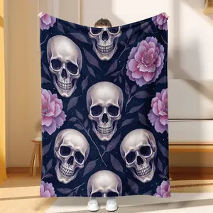 One-piece, luxurious flannel blanket, featuring Gothic-style skull and flower design, perfect for camping.
