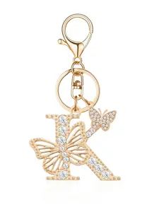 A Stylish And Luxurious Butterfly Keychain Featuring All 26 Letters of The English Alphabet, Adorned with Rhinestones And a Premium Golden Metal Initial. This Accessory Can Be Used As a Bag Charm Or a Car Pendant