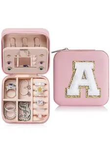 Portable mirrored travel jewelry box with a sequined letter pattern. This cute zippered storage box is a perfect gift for women, and also a stylish jewelry organizer for your room. It’s ideal for storing rings/earrings, and comes，（pink）