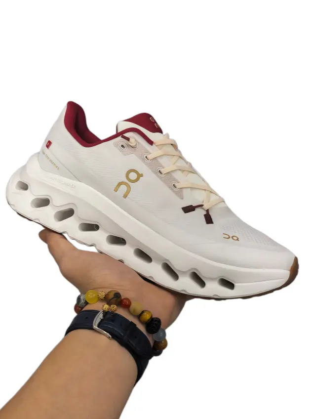 Off-white wine red hollow cushioned running shoes, thin knit mesh upper, multi-hole wavy midsole, solid support, casual sneakers for long jog and commute