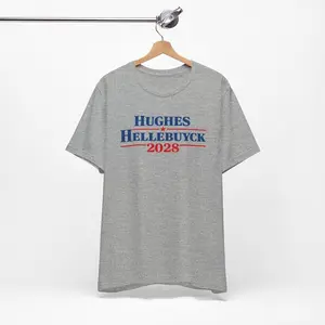 [Sale up to 30%] + [FREE SHIP] Hughes Hellebuyck 2028 T-Shirt - Funny Hockey Election Tee - USA Hockey Fan T-Shirt - Patriotic Hockey Graphic T-Shirt