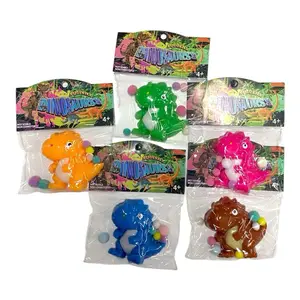 Dinosaur Squishy Stress Relief Taba Fidget Toy - Cute Dino Squeeze Sensory Toy with Colorful Pom Pom’s for Kids and Adults, Soft Stress Toy