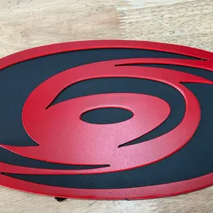 Black and red canes logo from steel and painted