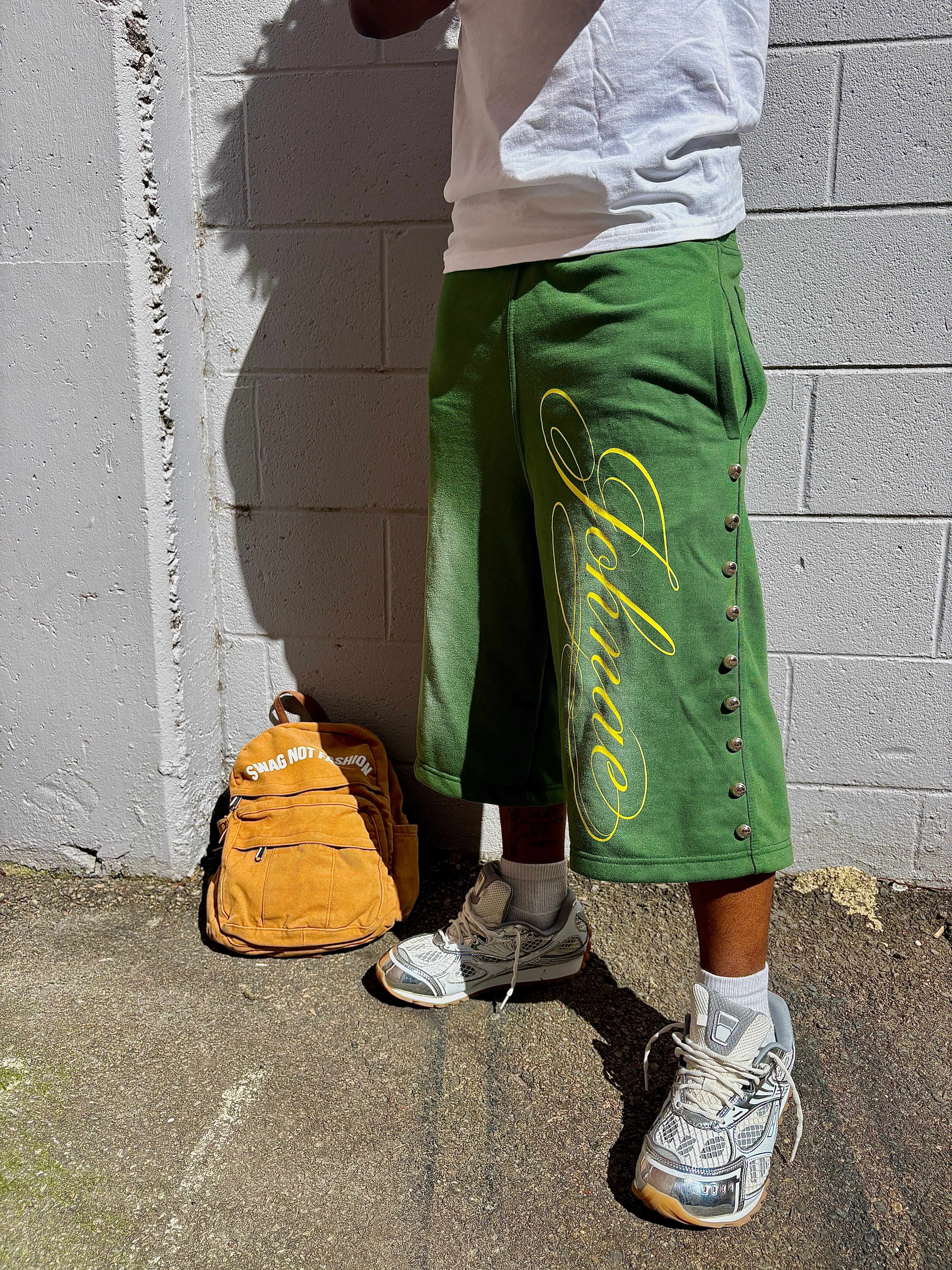 GREEN CALLIGRAPHY CAPRI SHORTS