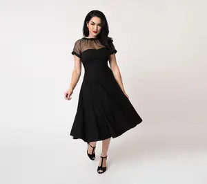 Unique Vintage 1950s Black Str etch Sheer Bodi ce Shirelle Swi