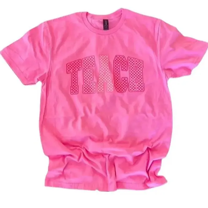 TEACH Checkered Pink Varsity Letters on Gildan Softstyle Azalea T-Shirt