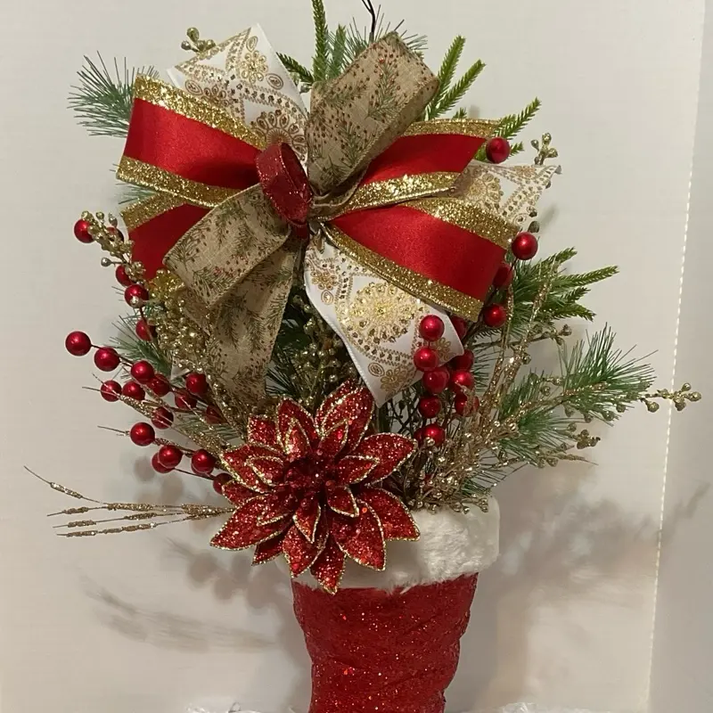 Sparkling Christmas Boot Handmade Holiday Centerpiece with Glittery Red Santa Boot Greenery Red Berries Poinsettia & Gold Accents Festive Layered Bow for Christmas Decorating Gifting or Office Décor