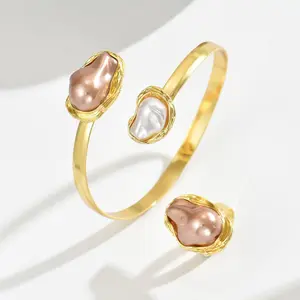 2-piece set of unique new women's pearl-inlaid bracelet and versatile open ring jewelry set, elegant for parties