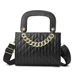Elegant Leather Handbag for Women with One Main Bag with Golden Chain Adjustable Shoulder Strap Stylish Accessory for Various Occasions