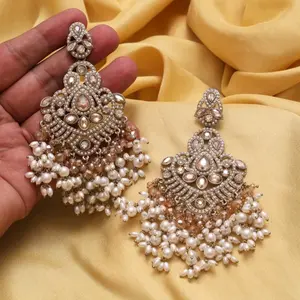 Gold Plated long earrings with Champagne Colored Stone work and faux white Pearls, Elegant Design for Any Occasion