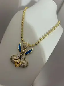 Cadena de balines dorada ajustable  con colgante de conejo azul brillante