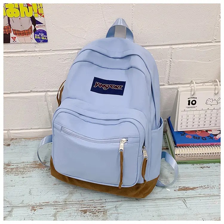 JanSport Light Blue Suede Bottom Classic Backpack, Pastel Baby Blue Faux Leather Base Student School Backpack, Casual Daypack for Teens College Girls