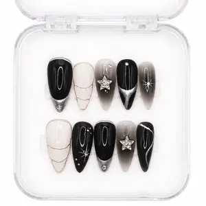 Bad Habit — Black & White Fade Stiletto Press-On Nails with Silver Star Accents