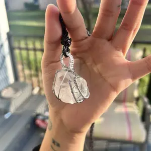 Silver copper wire wrapped clear quartz with prasiolite