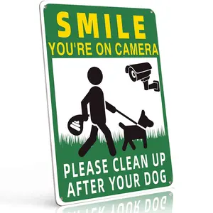 Smile You're On Camera Please Clean Up After Your Dog 8x12 Inch Aluminum Metal Sign Dog Owner Security Wall Decor for Yard Park and Community Spaces Retro Tin Poster Durable Weatherproof Easy to Hang