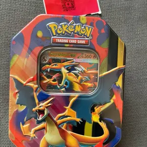 Pokemon TCG Mega Charizard Y ex Tin 4 Booster Packs & Charizard Promo Sealed