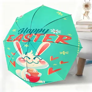 This waterproof folding umbrella features an Easter bunny holding an egg design and is suitable for both men and women. Portable and perfect for travel and everyday use.
