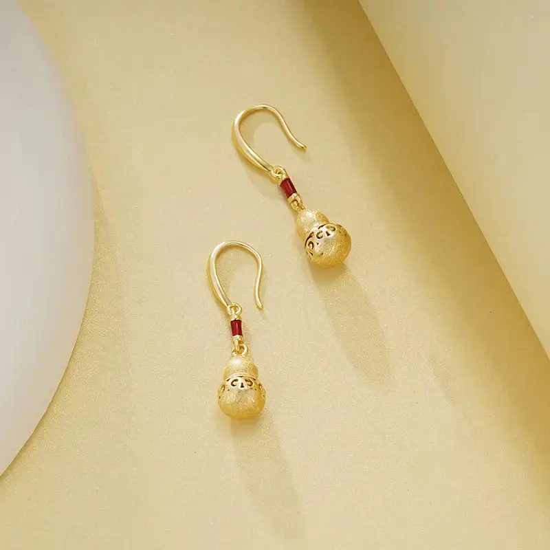 Gourd-shaped hollow earrings, new Chinese-style brushed ear cuffs, light luxury layered accessories long tassel hazard small part