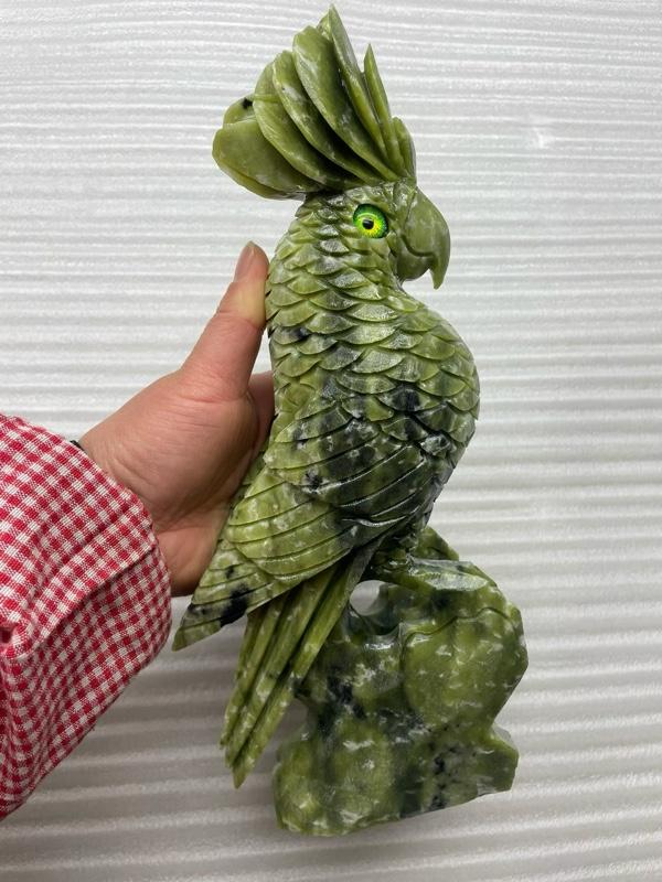 Parrots Carvings - Green Stone Sculpture with Detailed Feathers and Vivid Eye