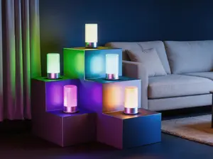 Touch control bedside table lamp, 3-level dimmable warm white light and 256 RGB colors. Modern portable LED lamp for bedroom and desktop use.