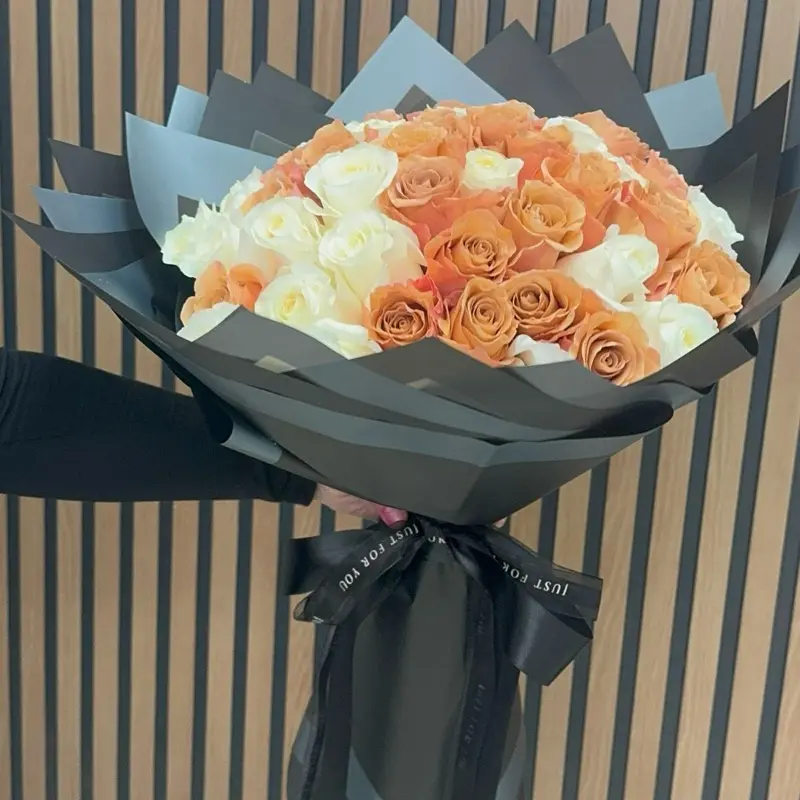 50 Roses Bouquet with Orange and White Roses in Elegant Black Packaging Perfect for Special Occasions