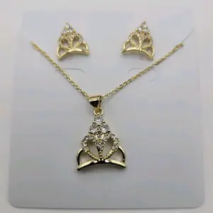 Beutiful Set Earring and pendant with clear stones laminated gold 17 inches for small necks small adults.