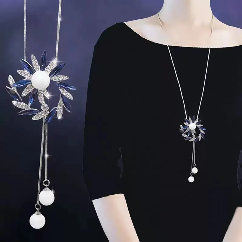 138 Blue Rotating Flower Necklace