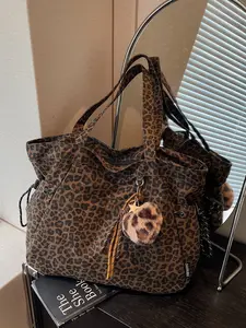 American Retro Leopard Print Tote Bag for Women Large Capacity Shoulder Bag with Cute Plush Pendant Versatile Daily Bag for Students Commute and School Fashionable Shopping Bag