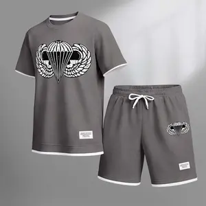 Men's War Print Drawstring Shorts Set For Spring/Summer. A Casual Summer Outfit, Including A Short-Sleeved Shirt And Shorts, Suitable For Everyday Wear And Sports. A Two-Piece Set For A Relaxed And Energetic Lifestyle.