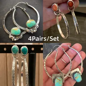 Fashionable women's jewelry set - elegant and dignified retro round synthetic green stone earrings. Palm-style jewelry. Hollow round exaggerated pendant earrings. Suitable for women. Beautiful gold man-made emerald hoop earrings.