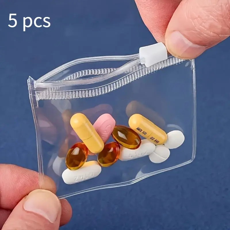 Portable zipper style transparent zipper bag, Space Saving Bags, for outdoor use - suitable for waterproof and dustproof storage of pills and jewelry.