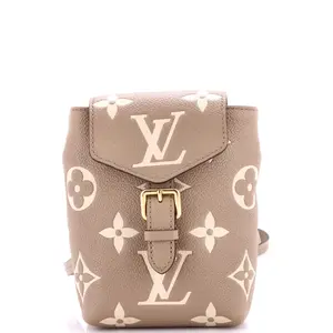 Pre-owned Louis Vuitton Leather Backpacks Tiny Backpack Bicolor Monogram Empreinte Giant by Rebag