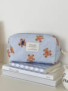 Versatile everyday makeup bag for commuting, blue striped bear makeup bag, cartoon style for girls, portable large-capacity quilted toiletry storage bag for going out, Cosmetic Bag