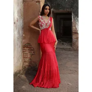 Nikhita coral pink pre-stitched saree and peplum