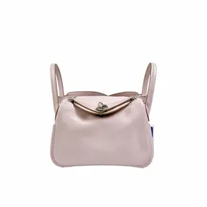 Pre-owned HERMÈS leather Shoulder Bags HERMES Swift Verso Mini Lindy 19 pink Mauve Pale Gold