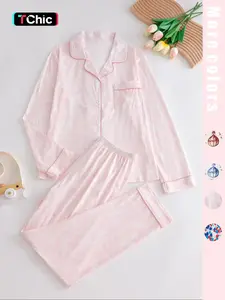 Two-piece pink ladies' pajama set with full-color prints. Button-front collar shirt and elastic waist pants pajama. Casual and comfortable collar long-sleeved top and long pants pajama set. Ladies' pajamas for spring and autumn.