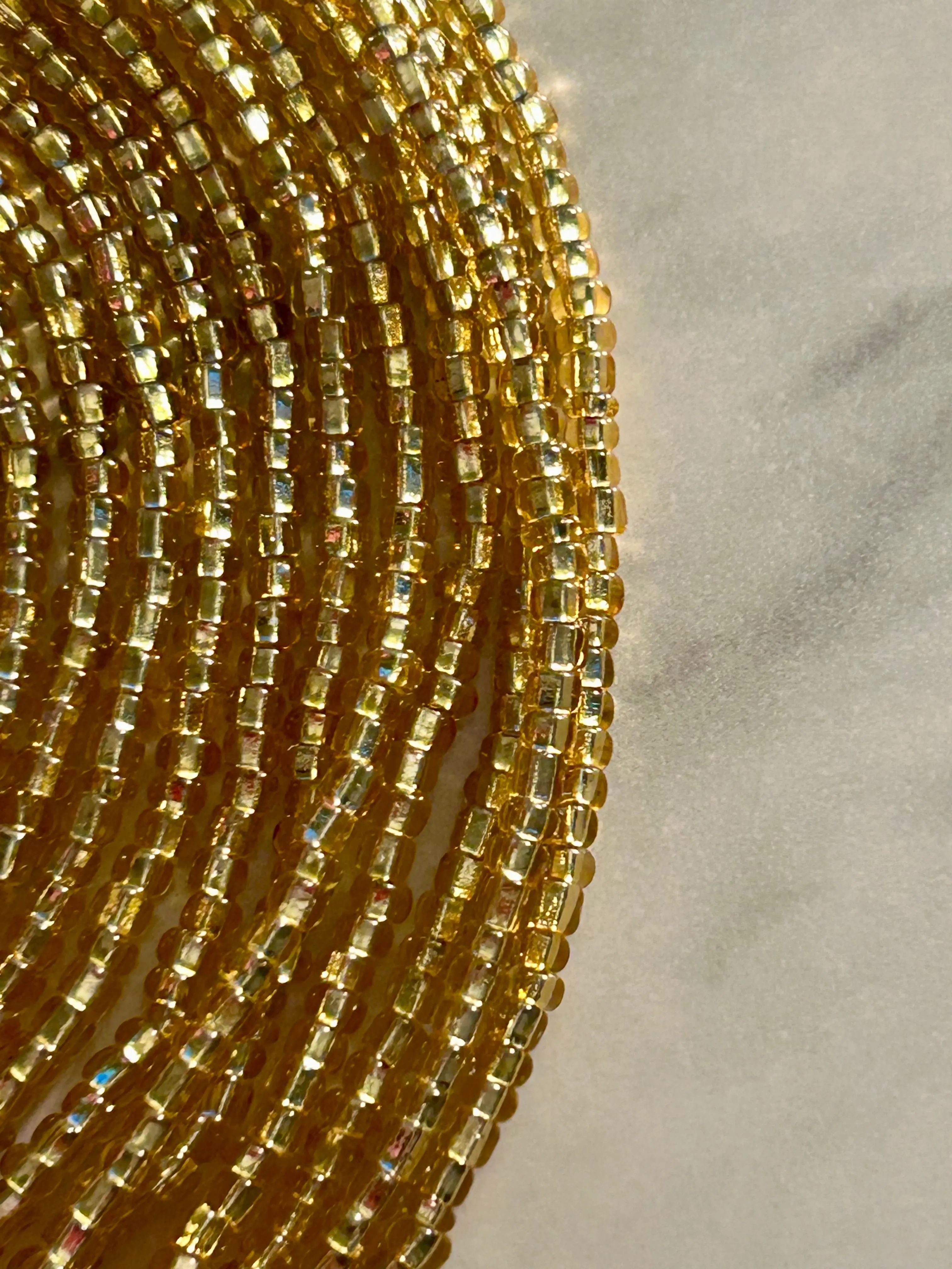 Royalty- Gold wiastbead with square cut beads