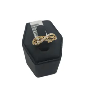 Infinity Ring with Texture and Zircon - Elegant Gold-Tone Design for Women