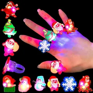 Christmas Stocking Stuffers for Kids 50Pcs LED Light Up Rings Flash Christmas Toys Glow in The Dark Goodie Bag Fillers Non Candy Gift Bag Stuffers Plastic