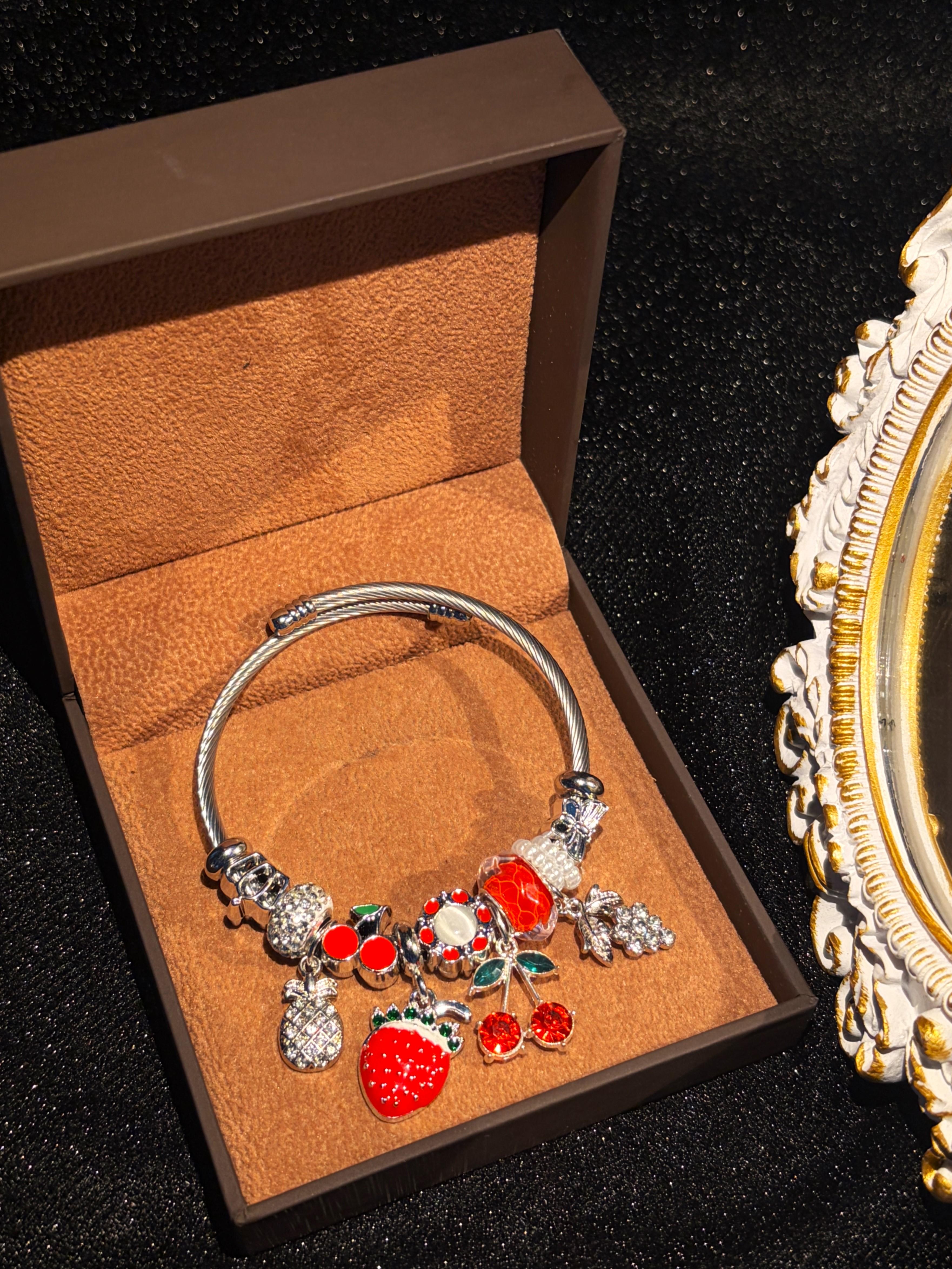 Silver-Tone Open Twist Wire Cuff Bangle, Vibrant Fruit-Themed Charm Bracelet with Strawberry, Cherry, Grape Dangles, Sweet Summer Holiday Gift Jewelry Silver-Tone Open Twist Wire Cuff Bangle, Vibrant Fruit-Themed Charm Bracelet with Strawberry, Cherry, Grape Dangles, Sweet Summer Holiday Gift Jewelry