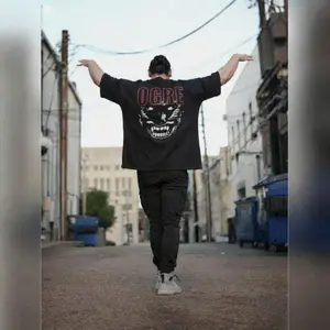 Ogre X Bxav Graphic Tee For Streetwear Enthusiasts Tee That Fits Everyone All Fit Cotton Style