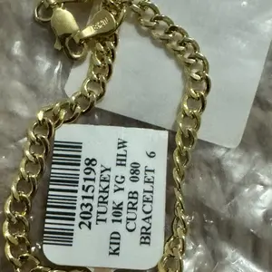 Kid 10K Gold Bracelet - Gold Color, Adjustable Chain, Featuring a Key and Coin Design