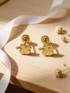 Unique, trendy, and lucky four-leaf clover ear cartilage stud earrings for women.