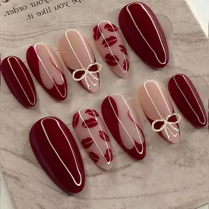 24pcs Romantic Red Press On Fake Nails, Medium Almond Shape, Full Cover Acrylic Nail Patches with Hand-Painted Lips, Heart Gradient & Gold Bow Accents, Includes 1 Jelly Gel and 1 Nail File. Perfect for Valentine's Day & Date Nights