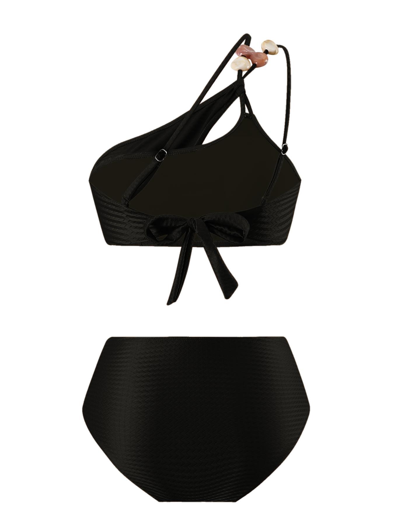 New European/American two-piece bikini swimsuit for women — sexy design with soft padding; three-piece set including a beach skirt, ideal for hot springs vacations.